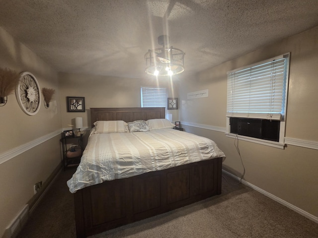 314 Concord Ave, Saint Marys, OH 45885 - carpeted bedroom with a textured ceiling and a chandelier