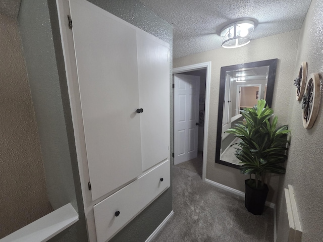 314 Concord Ave, Saint Marys, OH 45885 - hallway with a textured ceiling, carpet, a textured wall, and baseboards
