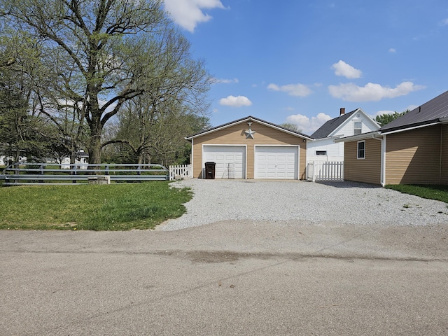 2 E Main St, Fletcher, OH 45326 - view of side of property with an outdoor structure and a garage