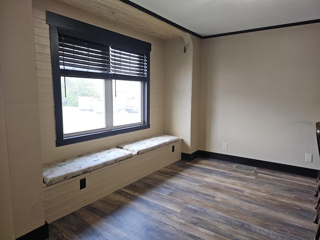2 E Main St, Fletcher, OH 45326 - empty room with dark wood-style flooring and ornamental molding