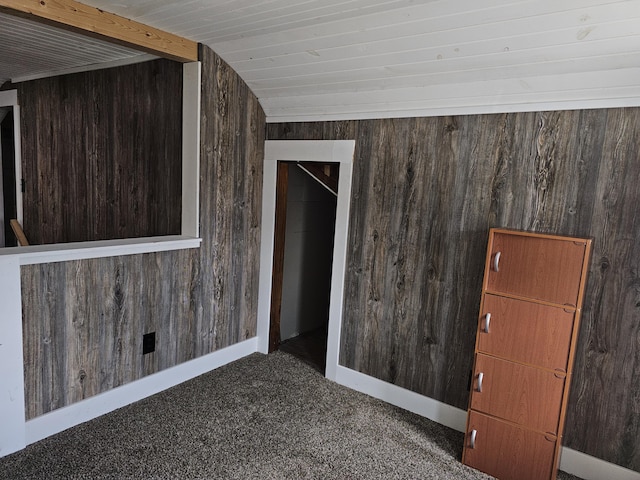 2 E Main St, Fletcher, OH 45326 - carpeted empty room featuring wood walls and baseboards