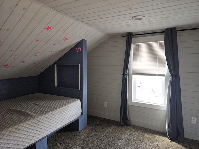 2 E Main St, Fletcher, OH 45326 - unfurnished bedroom featuring vaulted ceiling, wooden walls, carpet floors, and wood ceiling