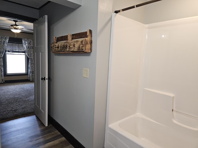 2 E Main St, Fletcher, OH 45326 - full bath with wood finished floors, bathing tub / shower combination, and a ceiling fan