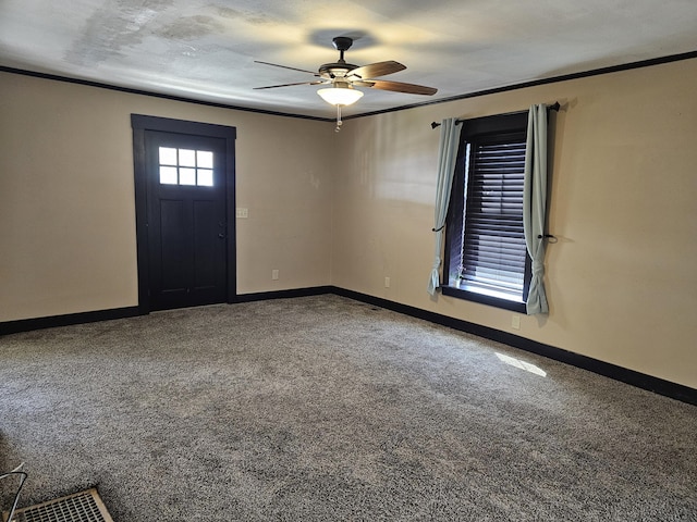 2 E Main St, Fletcher, OH 45326 - carpeted entrance foyer featuring ceiling fan and baseboards