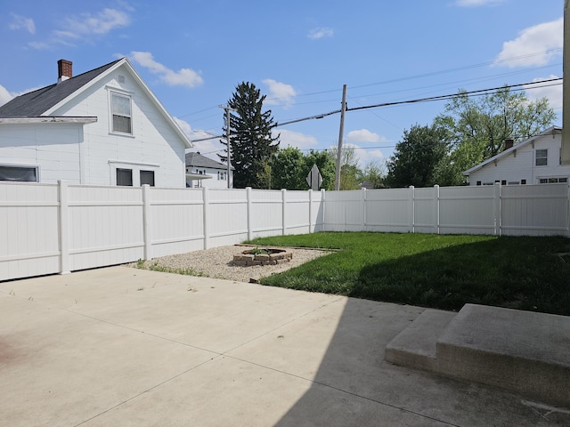 2 E Main St, Fletcher, OH 45326 - fenced backyard featuring a patio area