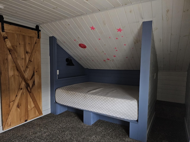 2 E Main St, Fletcher, OH 45326 - carpeted bedroom with vaulted ceiling and wooden walls