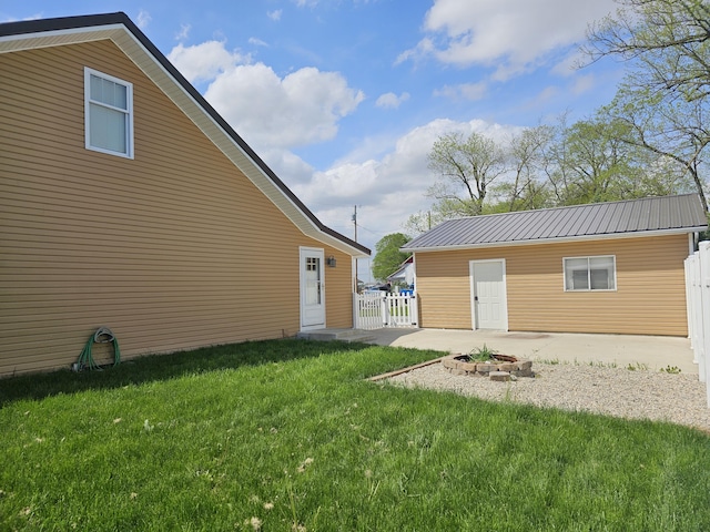2 E Main St, Fletcher, OH 45326 - view of yard with an outdoor fire pit and a patio area