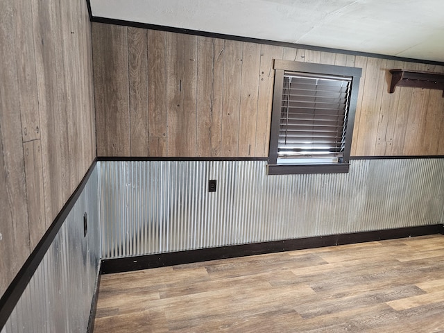 2 E Main St, Fletcher, OH 45326 - spare room with wooden walls and wood finished floors