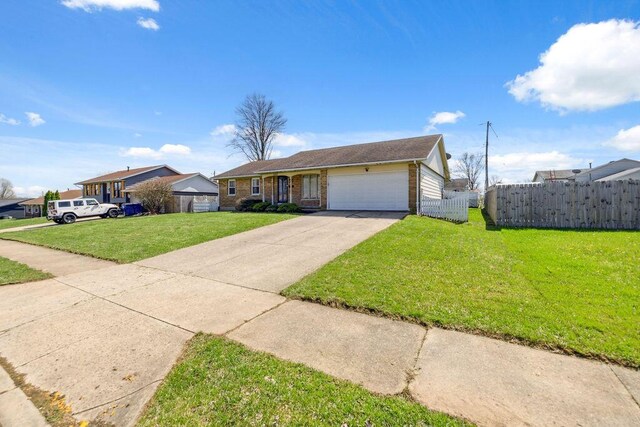 1405 Providence Ave, Springfield, OH 45503 - view of front facade featuring an attached garage and driveway