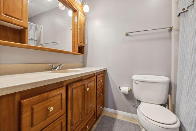 1405 Providence Ave, Springfield, OH 45503 - bathroom with vanity, curtained shower, and tile patterned flooring