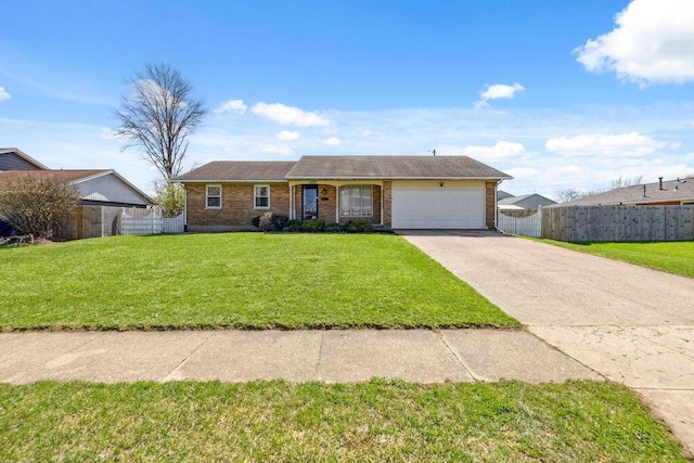 1405 Providence Ave, Springfield, OH 45503 - ranch-style home with an attached garage, driveway, and brick siding