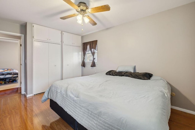 1405 Providence Ave, Springfield, OH 45503 - bedroom with light wood finished floors, multiple closets, and ceiling fan