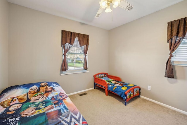 1405 Providence Ave, Springfield, OH 45503 - carpeted bedroom with multiple windows and ceiling fan