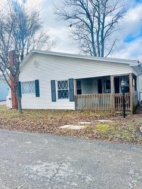 view of front of home featuring covered porch