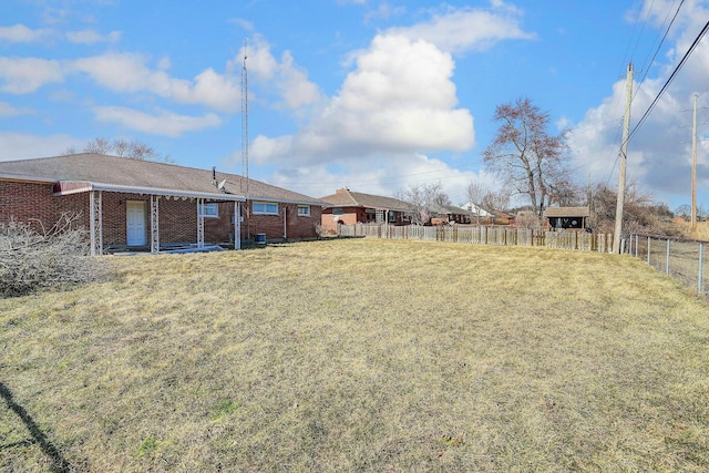 view of yard featuring fence