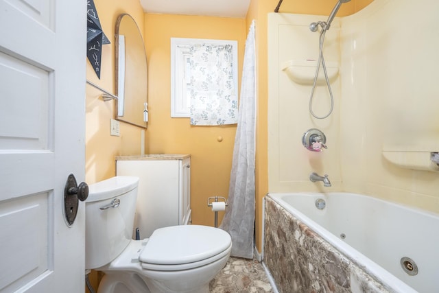 bathroom with shower / bath combo with shower curtain, toilet, and vanity