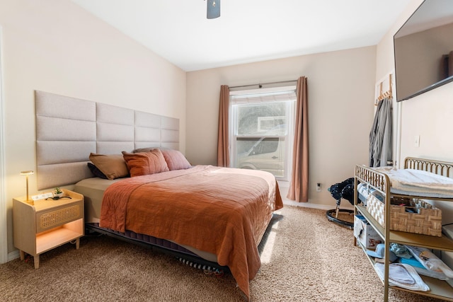 carpeted bedroom featuring baseboards and ceiling fan