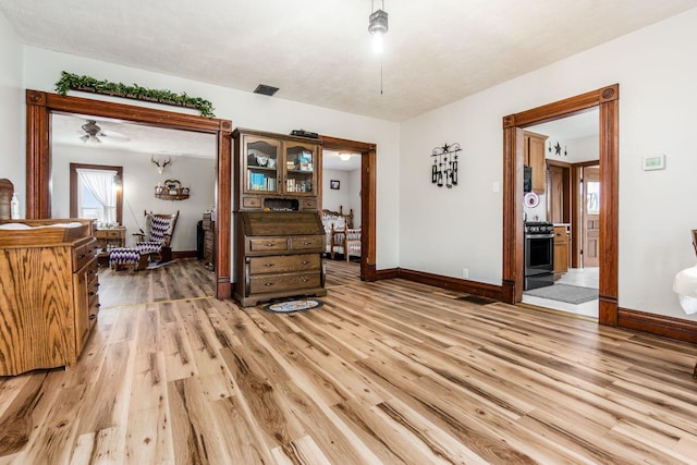 sitting room with light hardwood / wood-style floors