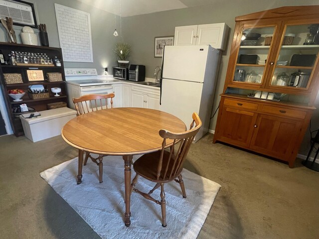 450 Yale Ave, Lima, OH 45804 - dining room with a wall mounted AC and light colored carpet