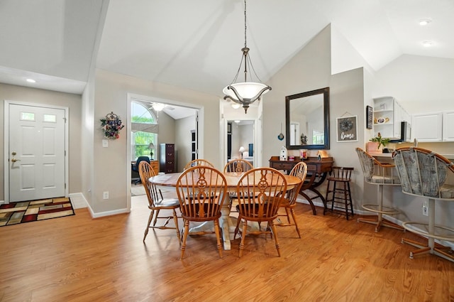 2696 Prestwick Village Cir, Springfield, OH 45503 - dining area with vaulted ceiling, light wood finished floors, a ceiling fan, recessed lighting, and baseboards