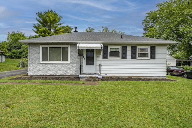 5385 Woodbine Ave, Dayton, OH 45432 - bungalow-style house with a front lawn