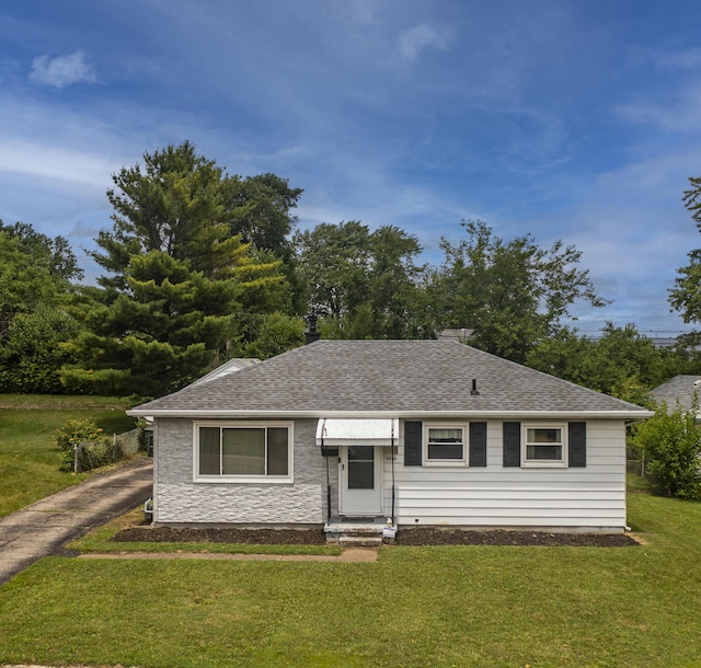 5385 Woodbine Ave, Dayton, OH 45432 - view of front of home with a front lawn and a shingled roof