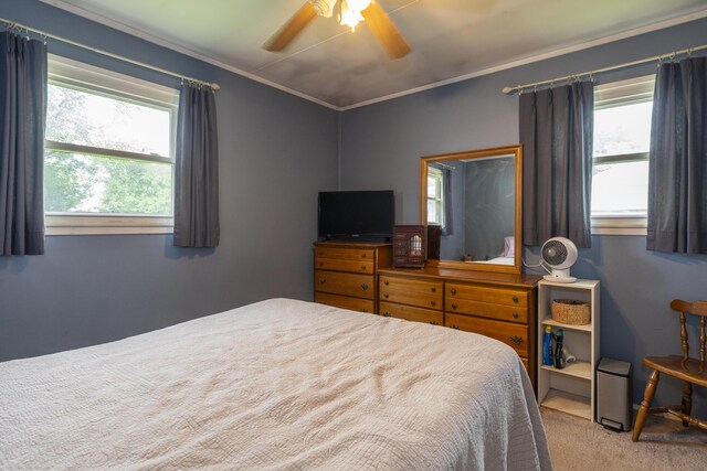 5385 Woodbine Ave, Dayton, OH 45432 - carpeted bedroom featuring crown molding and a ceiling fan