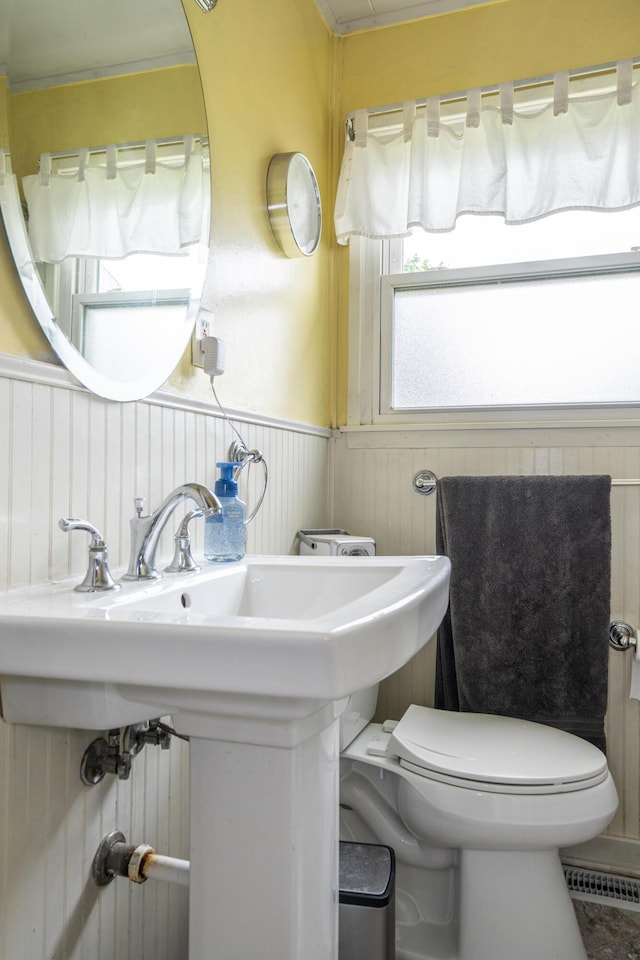 5385 Woodbine Ave, Dayton, OH 45432 - bathroom featuring a wainscoted wall and crown molding