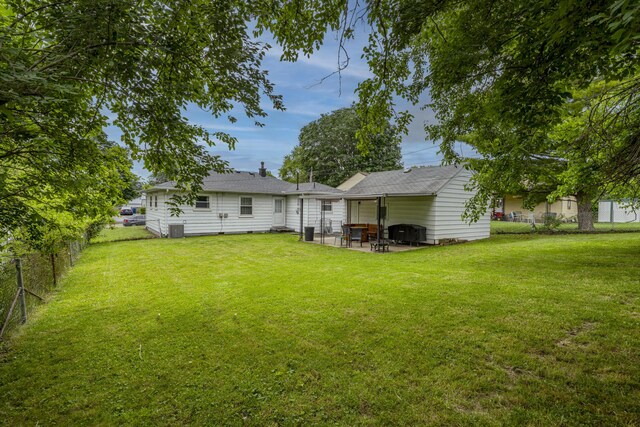 5385 Woodbine Ave, Dayton, OH 45432 - rear view of house with a patio area