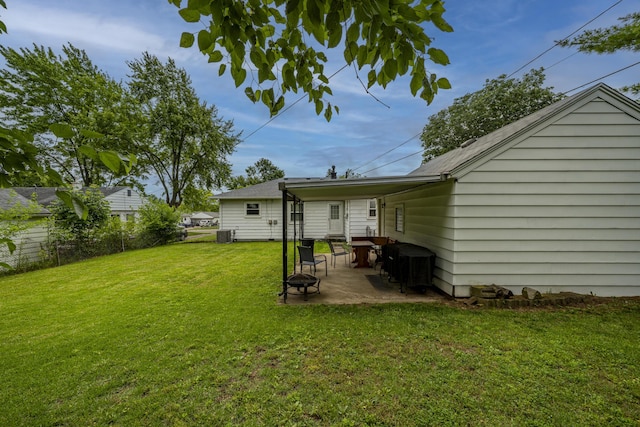 5385 Woodbine Ave, Dayton, OH 45432 - view of yard featuring a fire pit and a patio