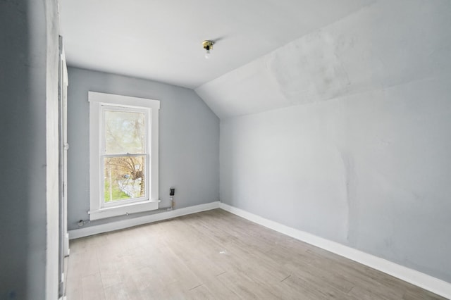 2100 Wayne Ave, Dayton, OH 45410 - additional living space featuring lofted ceiling, wood finished floors, and baseboards