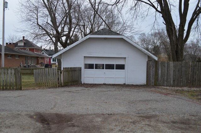 detached garage with fence