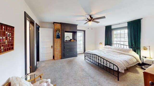 bedroom featuring carpet floors and ceiling fan