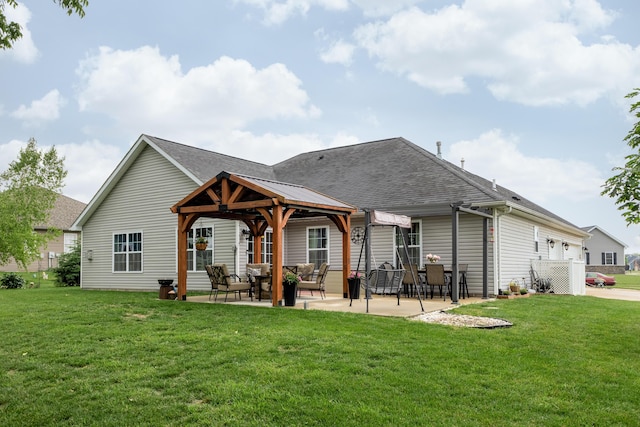 725 Loxley Ln, Troy, OH 45373 - back of property with roof with shingles, a yard, and a gazebo