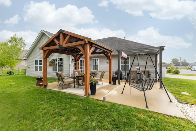 725 Loxley Ln, Troy, OH 45373 - rear view of house featuring a gazebo, a lawn, roof with shingles, and a patio