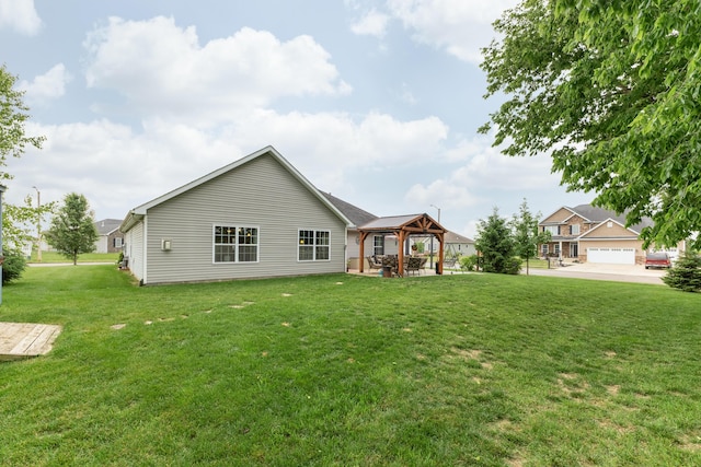 725 Loxley Ln, Troy, OH 45373 - back of house with a gazebo and a yard