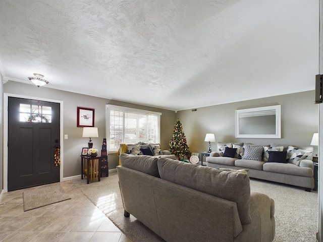 living room featuring light tile patterned floors and a textured ceiling