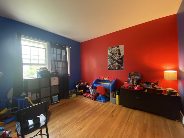 bedroom featuring wood finished floors