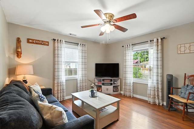 11372 Kickapoo Path, Lakeview, OH 43331 - living room featuring wood finished floors and a ceiling fan