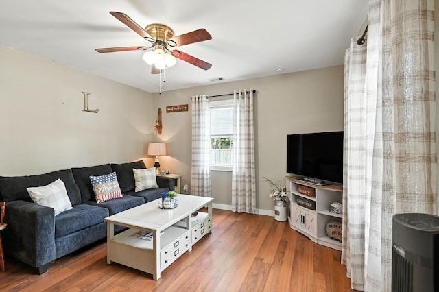 11372 Kickapoo Path, Lakeview, OH 43331 - living area with a ceiling fan and wood finished floors
