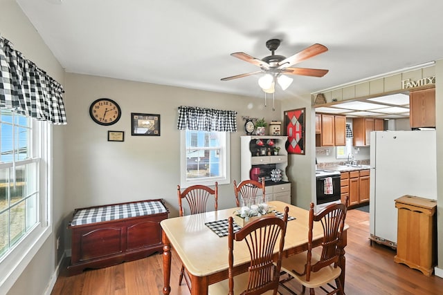 11372 Kickapoo Path, Lakeview, OH 43331 - dining area with wood finished floors and ceiling fan