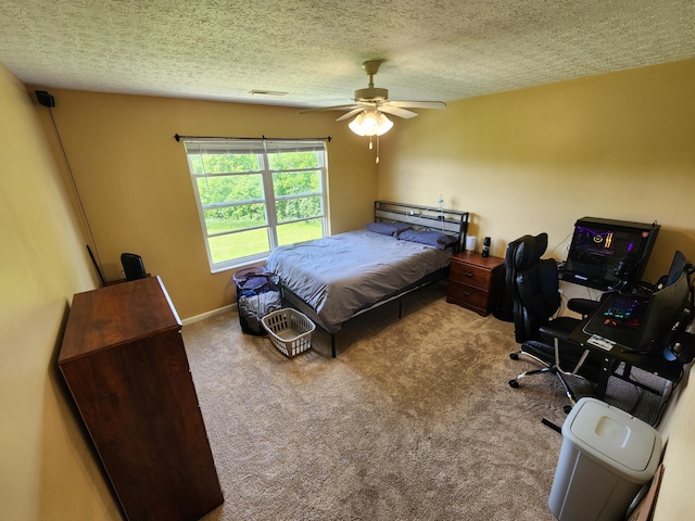 2380 W Patterson Ln, Troy, OH 45373 - carpeted bedroom with a textured ceiling and a ceiling fan