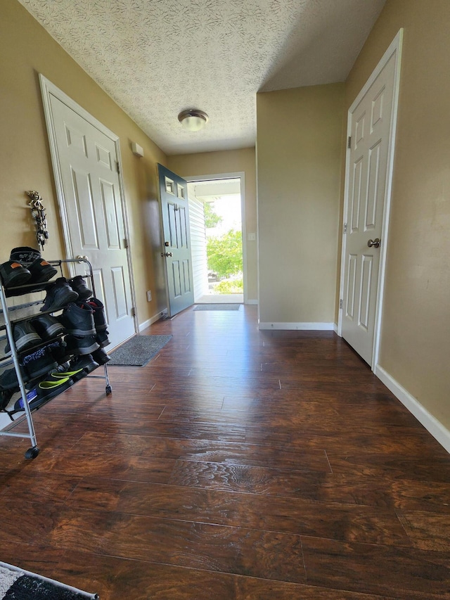 2380 W Patterson Ln, Troy, OH 45373 - foyer with wood-type flooring and a textured ceiling