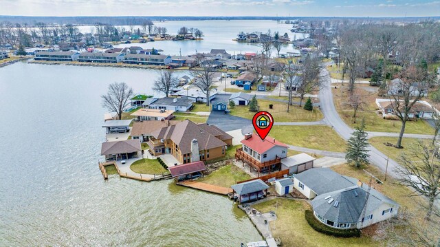 10989 Seminole Shore Dr, Huntsville, OH 43324 - aerial view of residential area featuring a nearby body of water
