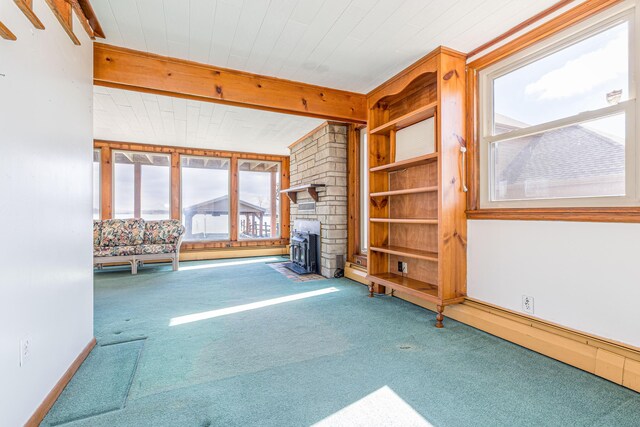 10989 Seminole Shore Dr, Huntsville, OH 43324 - unfurnished living room with carpet, wood ceiling, baseboards, and a fireplace