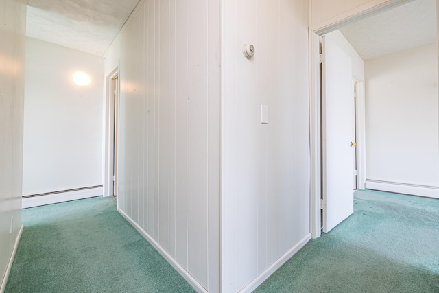 10989 Seminole Shore Dr, Huntsville, OH 43324 - hall with baseboard heating, carpet floors, and baseboards