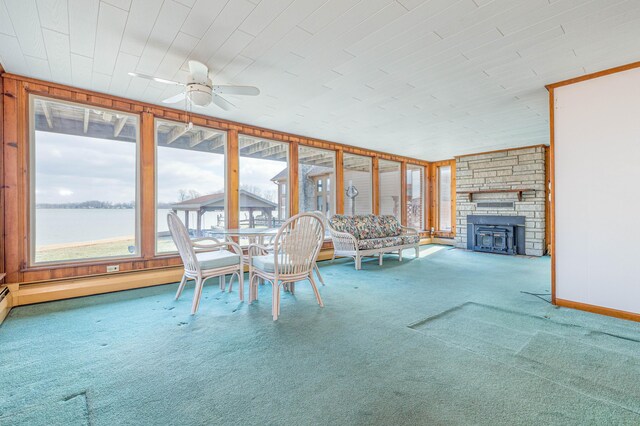 10989 Seminole Shore Dr, Huntsville, OH 43324 - sunroom / solarium with healthy amount of natural light, carpet floors, baseboards, and a baseboard radiator