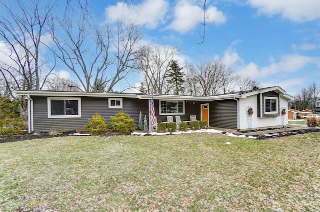 single story home with a front yard