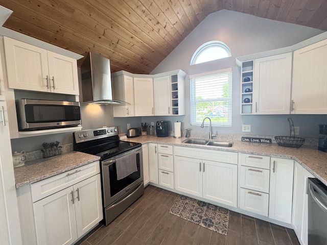 13864 Public Dr, Lakeview, OH 43331 - kitchen featuring stainless steel appliances, wall chimney range hood, a sink, lofted ceiling, and open shelves