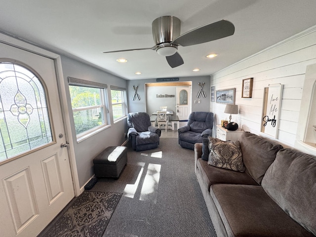 13864 Public Dr, Lakeview, OH 43331 - living room featuring carpet floors, ceiling fan, recessed lighting, and wooden walls